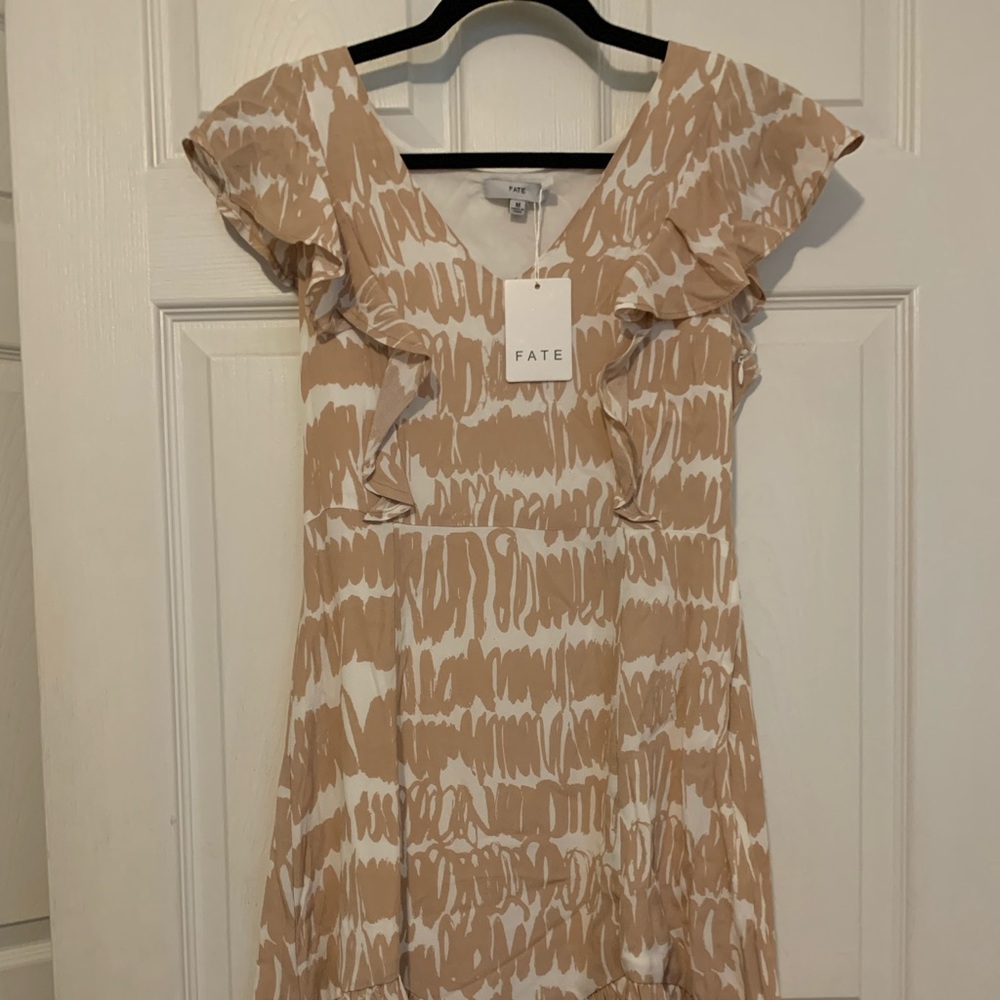 NWT Never Worn. Size Medium. Brand Fate.